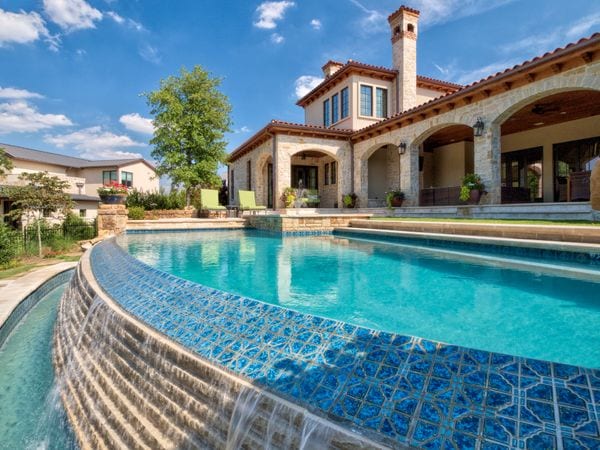 A gorgeous new pool with beautiful pool tiles.