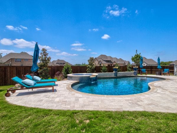 A gorgeous concrete residential pool.