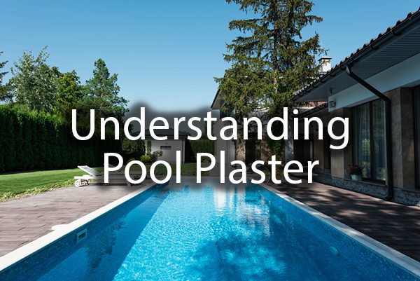 A gorgeous shot of a lap pool with the words, "Understanding Pool Plaster."